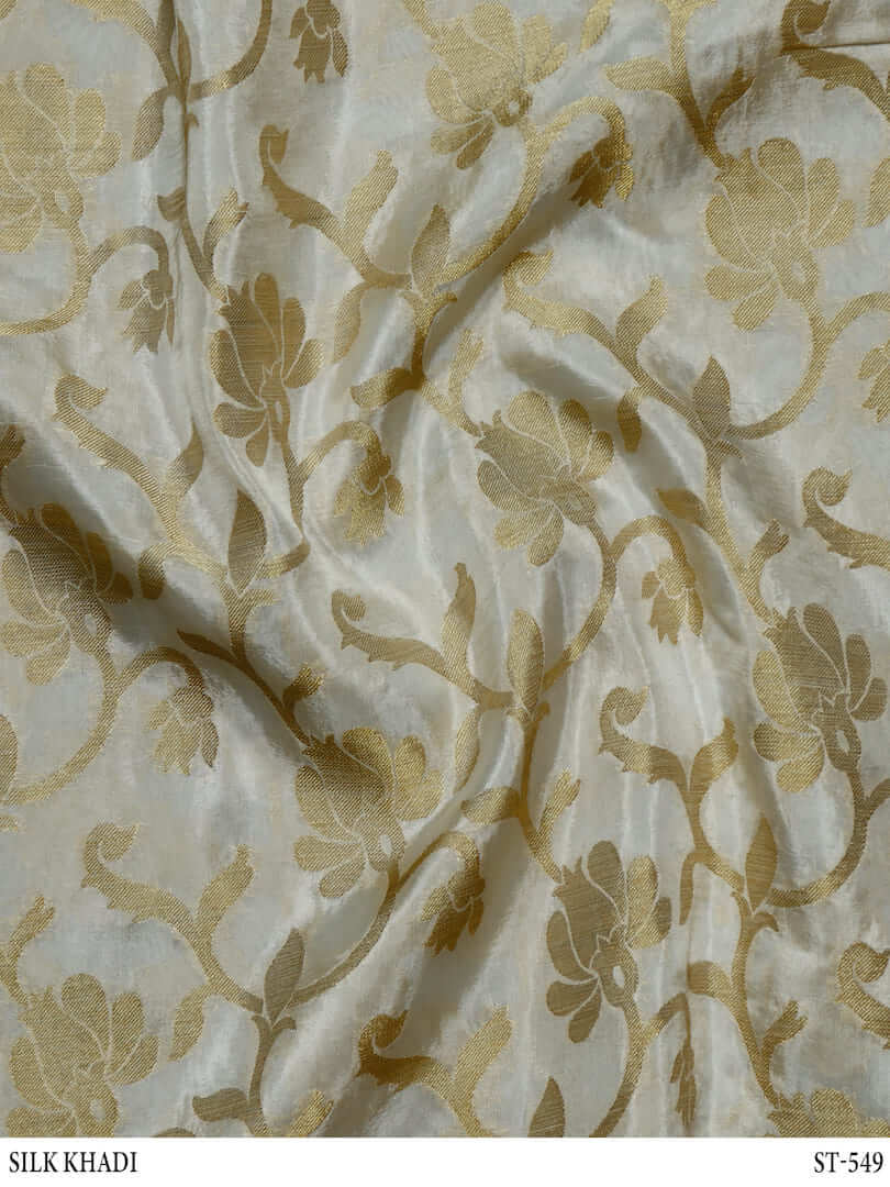 Dola Silk Khadi Floral Zari Woven Off White Dyeable Fabric